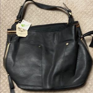 New black purse, never used with tags.  Vegan.